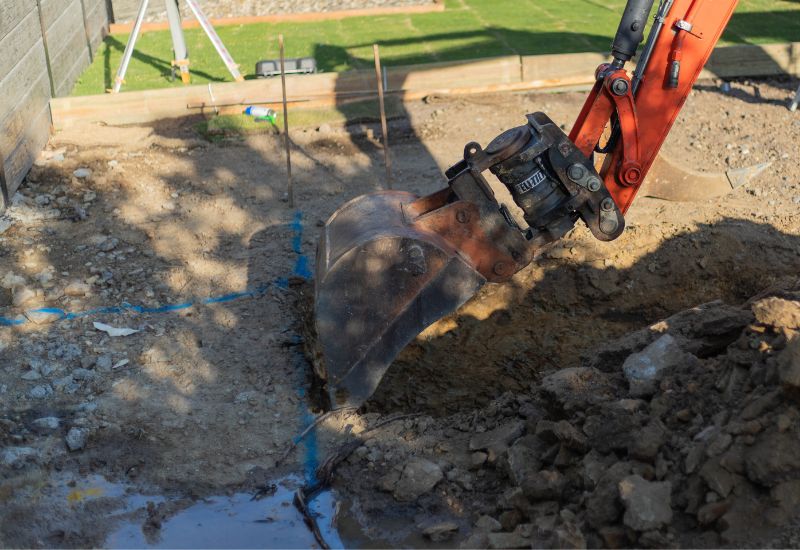Laser set-out marking the pool outline on site