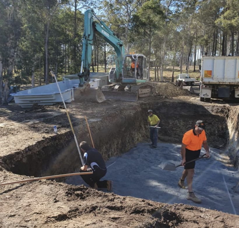 Digging pool hole using excavation equipment